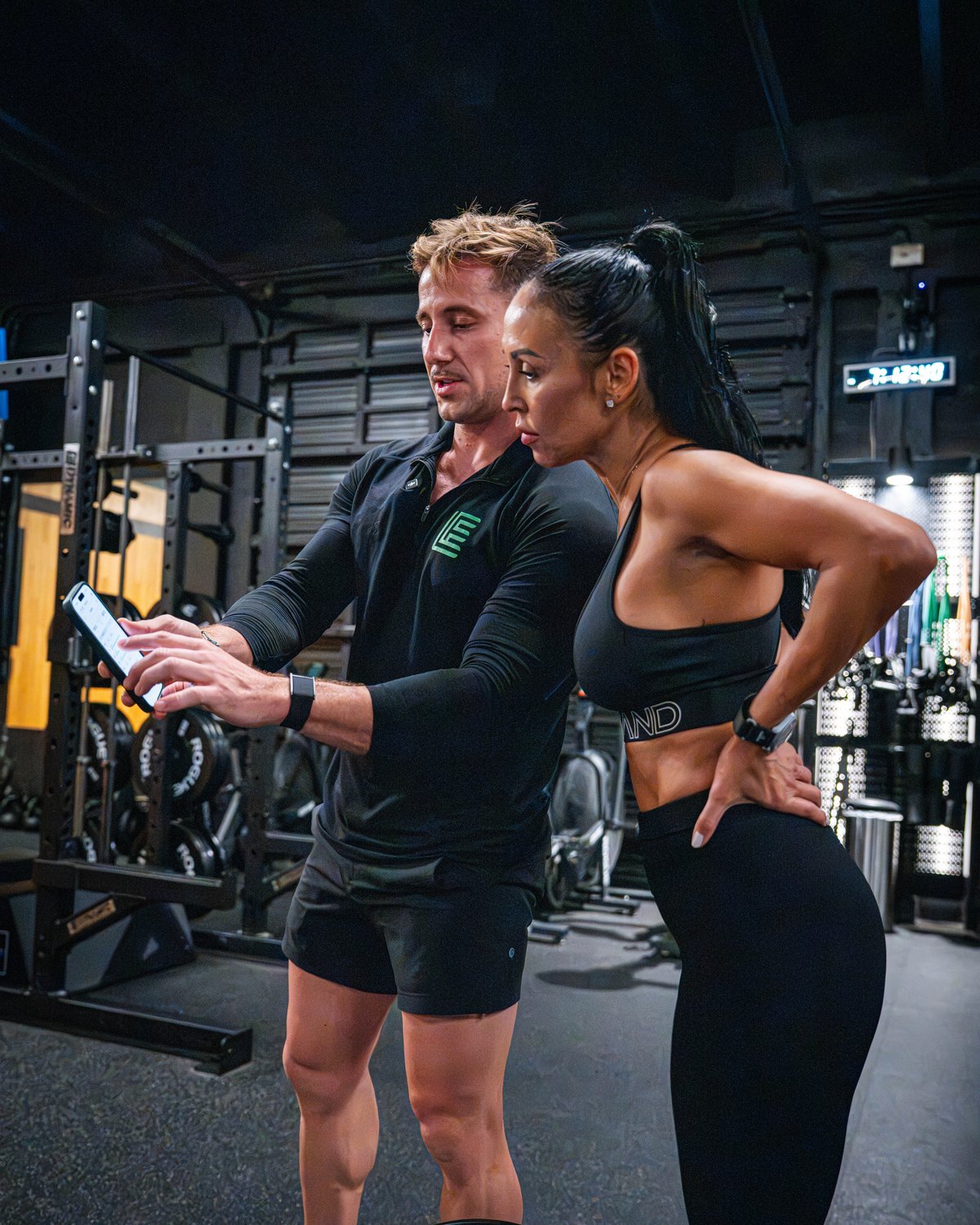 Damjan walking a client through her program on the phone
