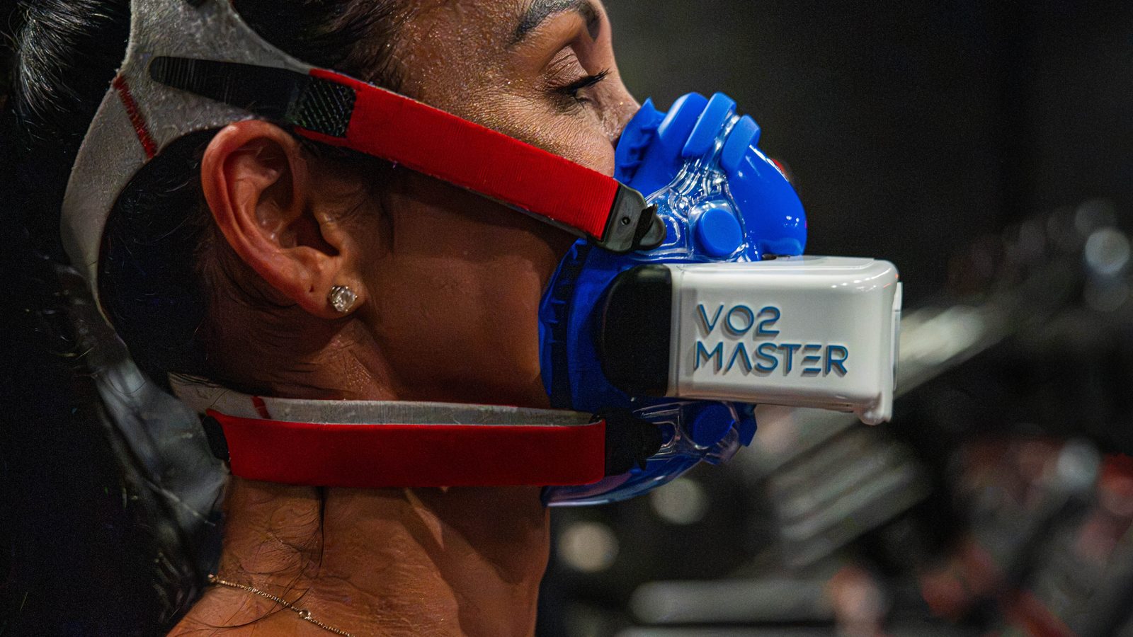 A client on the treadmill in the VO2 Master mask during a VO2 max test
