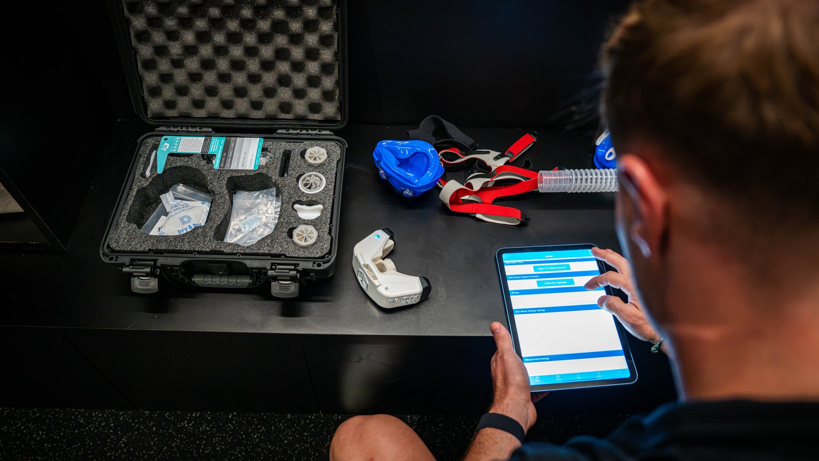 Damjan preparing the VO2 Master kit on the tablet before a test